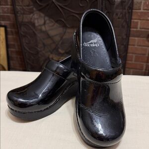 Dansko Woman’s Black Patent Leather Slip-On Clogs, Size 36 (6-6.5 USA)